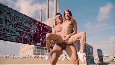Oiled Blonde Spreads Her Legs Outdoors, Then Takes His Cock Standing Up